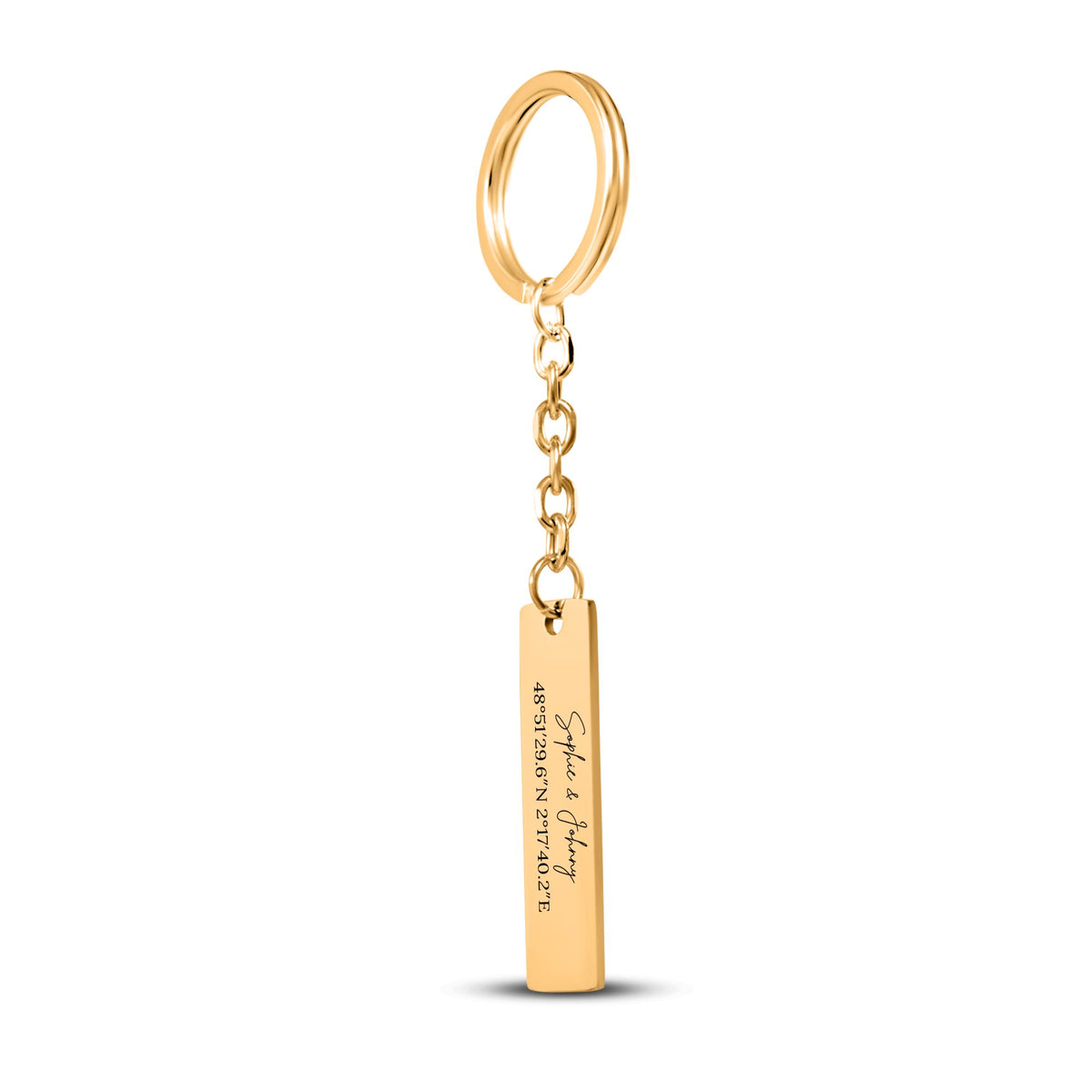 De gouden staafsleutelhanger met ring en ketting, tegen wit