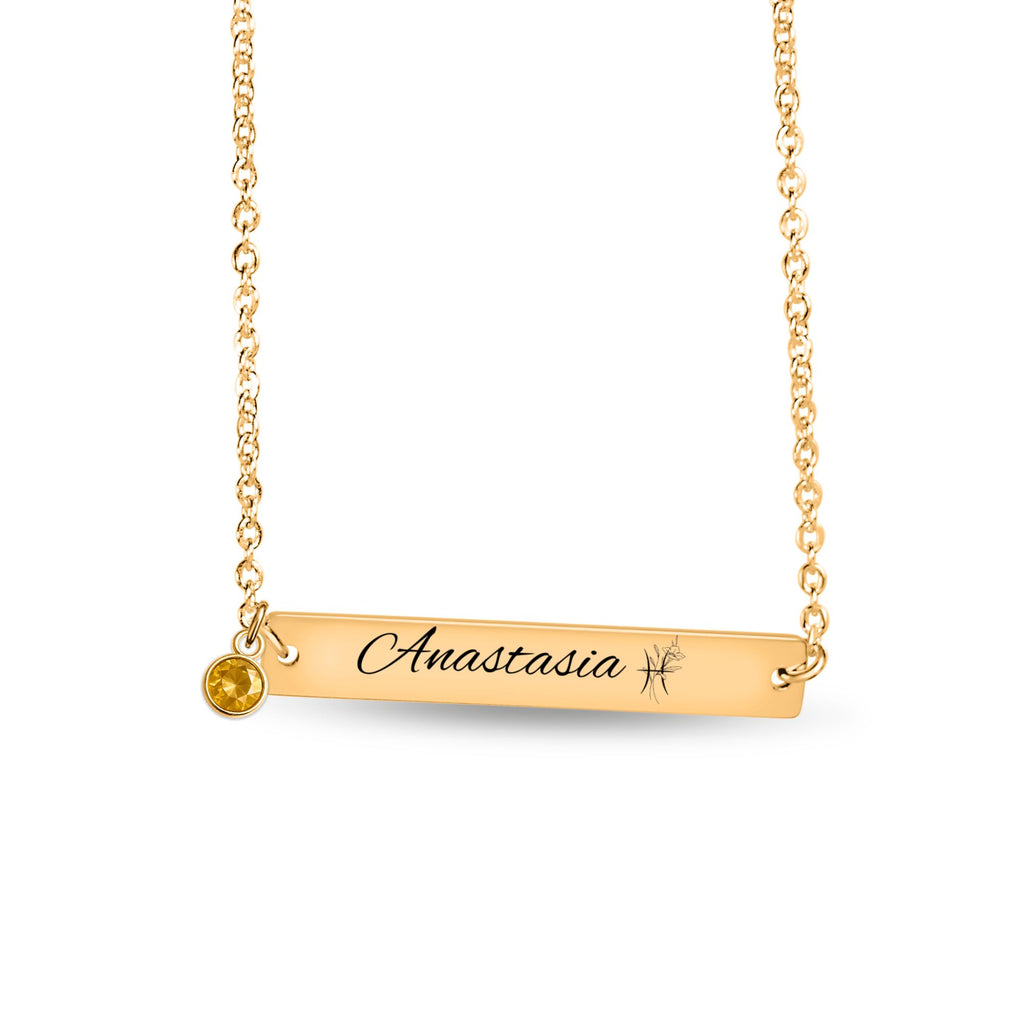 De gouden horizontale staafketting met geboortesteen, tegen wit