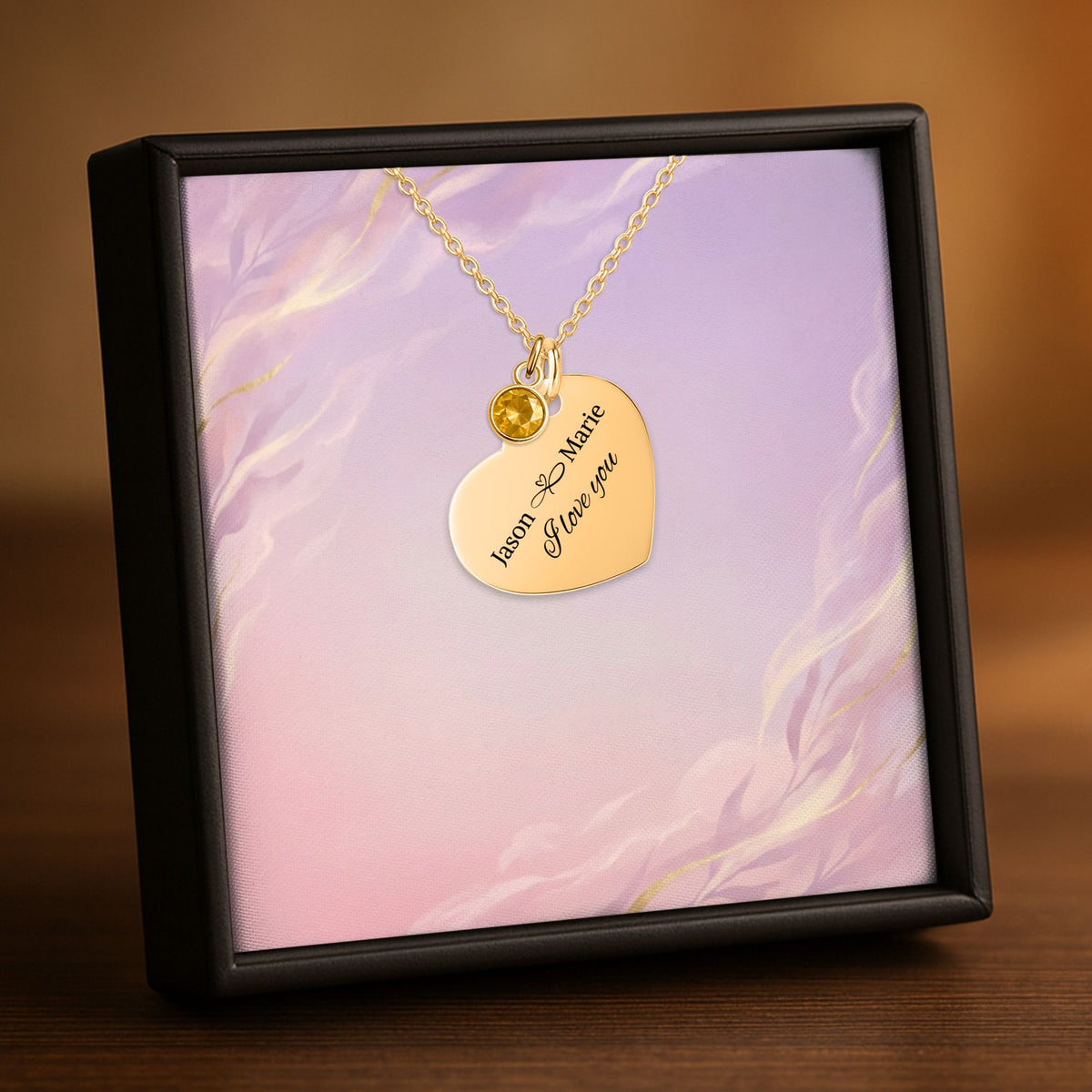 De hartketting met geboortesteen in goud, in een geschenkdoosje