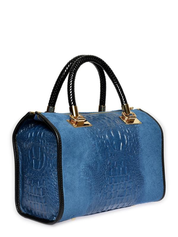 De blauwe handtas van achteren