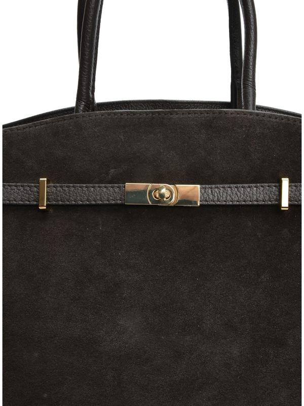 Close-up van het leer en het beslag van de donkerbruine shopper
